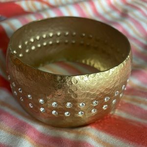 Bright gold bangle with rhinestones